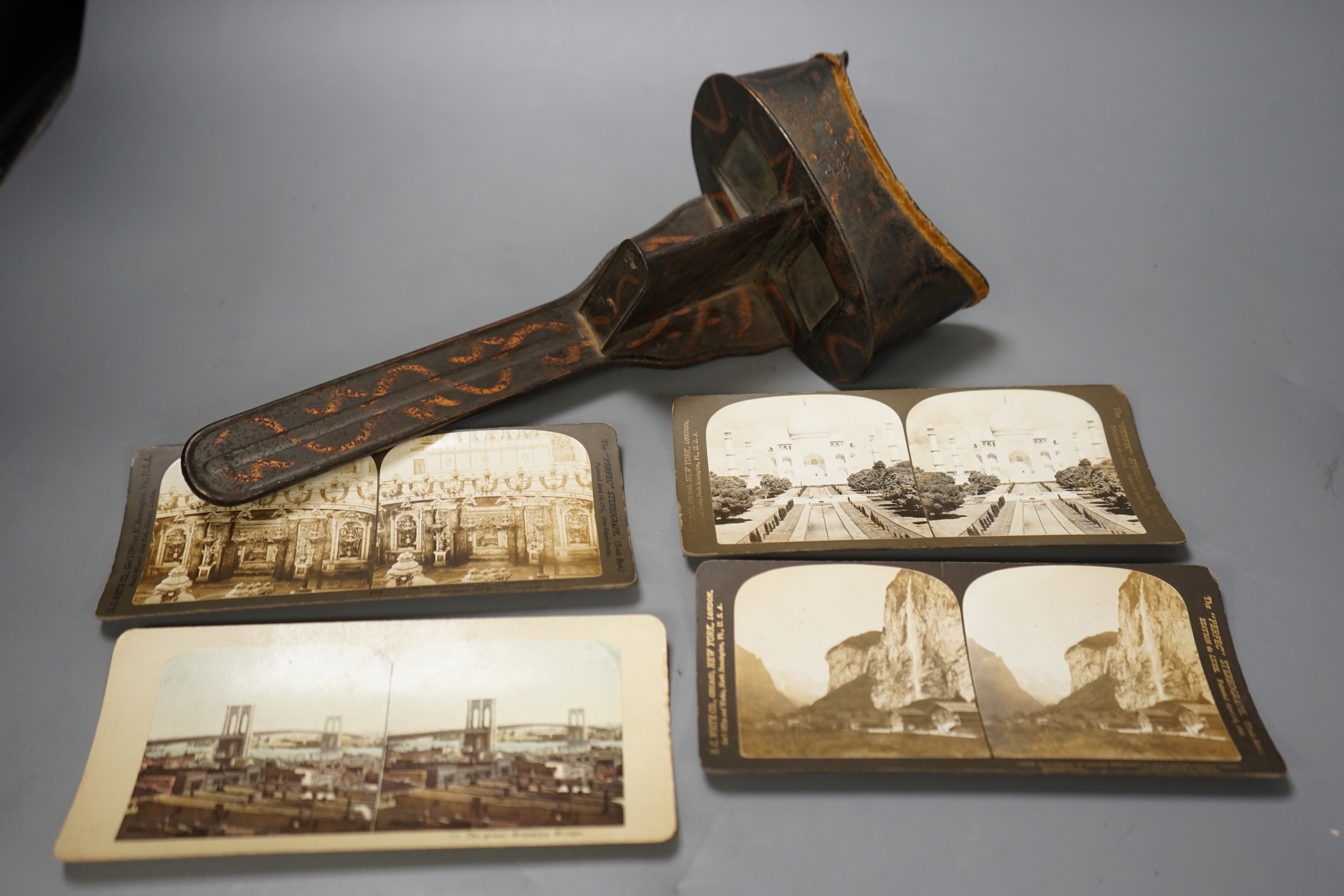 A 19th century stereoscopic viewer, together with European and American views